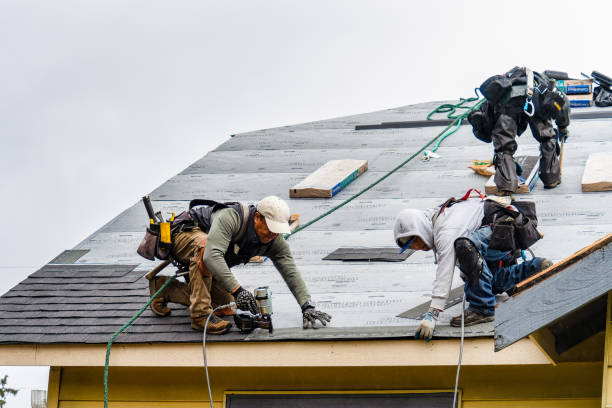 Professional Gutter Installation technician working in Bay Shore, NY